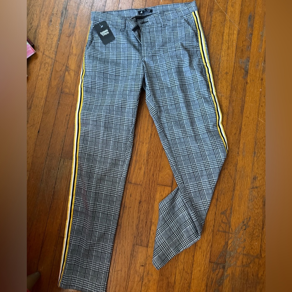 Brand new adorable pants with tag still on. Plaid print with yellow stripes